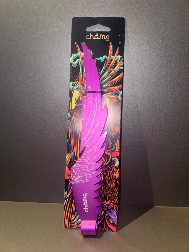 Pegador de Carvão Chāms Pena Roxo